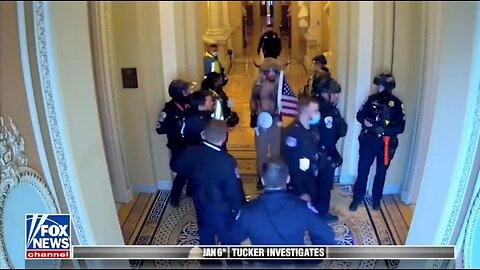 January 6 Video Shows Capitol Police Escorting QAnon Shaman To Senate Floor