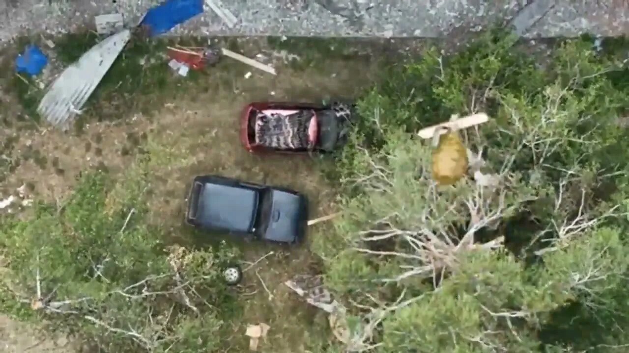 Russian Drone Dropping An F-1 Grenade On Ukrainian Militants Positions