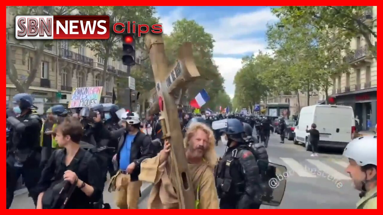 French Protester Carrying a Message on the Cross - 2946