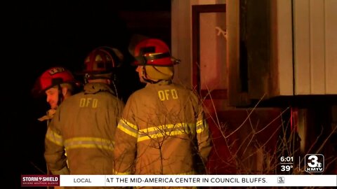 Omaha Fire Department crews respond to house fires on opposite sides of city Tuesday night