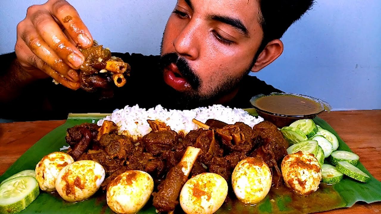 SPICY DESHI MUTTON AND EGG WITH RICE EATING