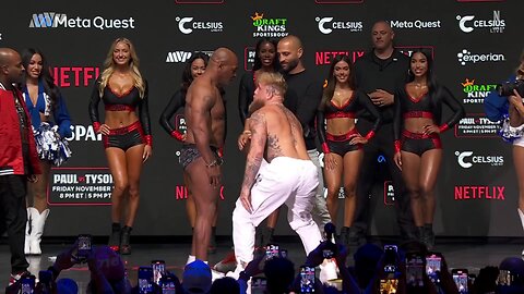 Mike Tyson slaps Jake Paul during the final weigh-in before Friday’s fight