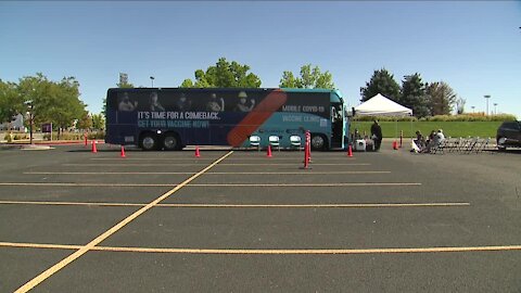 Colorado to open large vaccination sites as employer-mandates begin