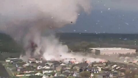 Drone footage from yesterday in Kansas.The Tornado rips through Kansas