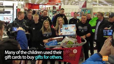 Police officers spread Christmas cheer to children of fallen officers