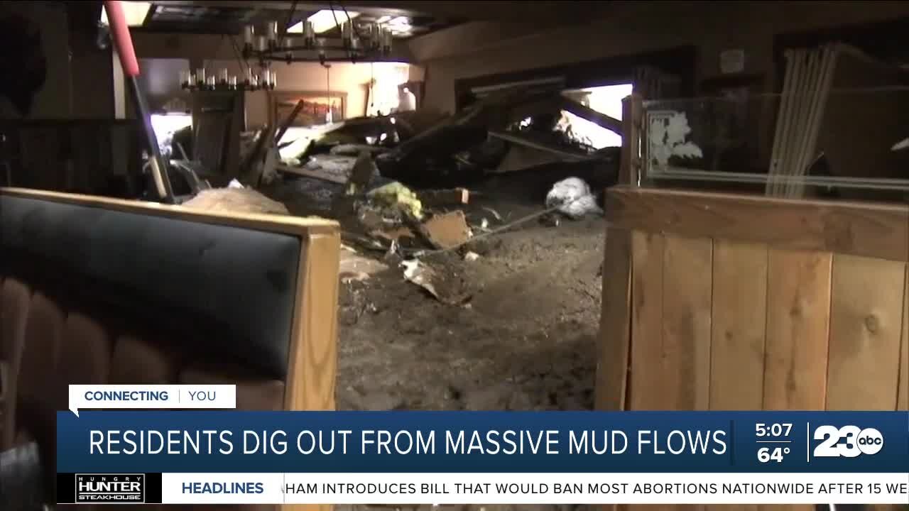 Residents dig out from massive mud flows