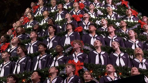 Dozens of Michigan high school choir students perform in 67-foot Singing Christmas Tree