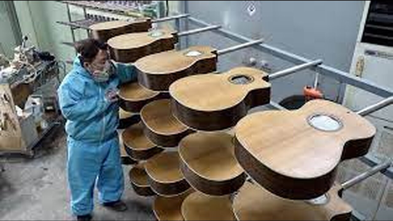 Guitar manufacturing process in the factory