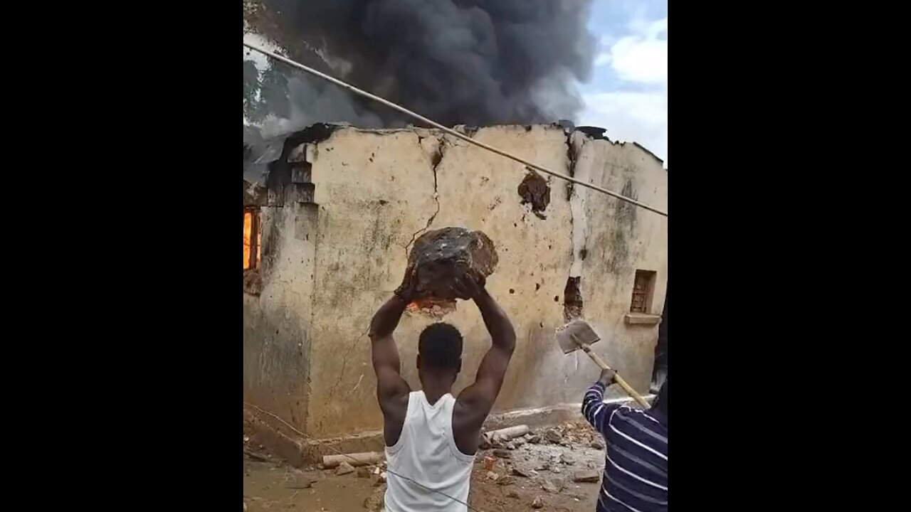 Black guys trying to extinguish a fire