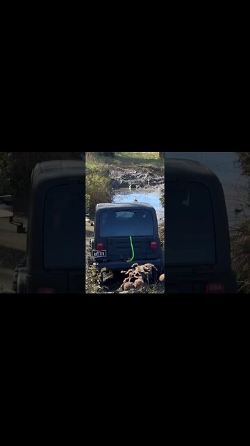 Jeep Barely Makes it Across Mud Hole