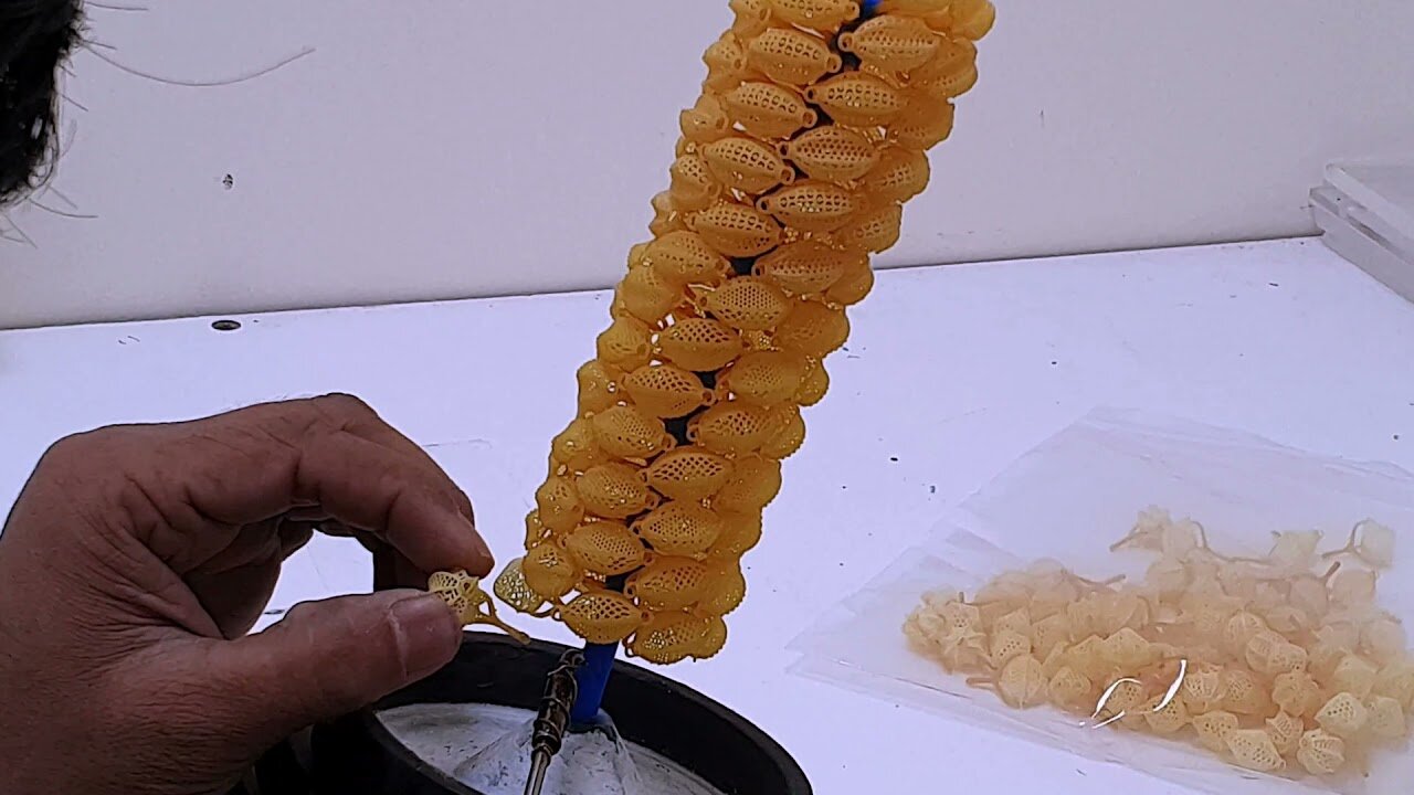 Getting the wax tree ready for casting