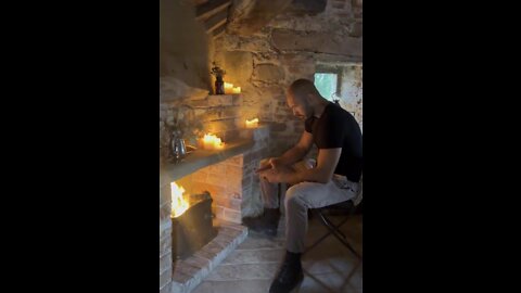 ANDREW TATE BY THE FIRE PLACE