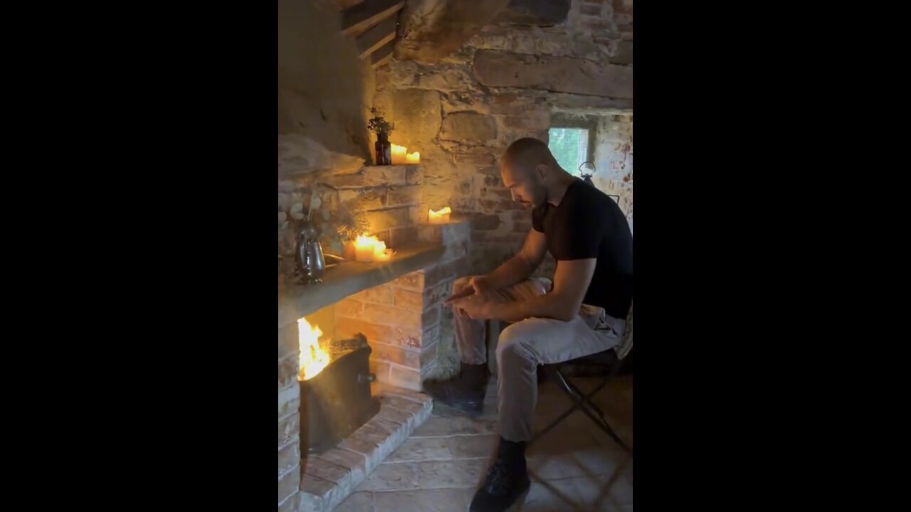 ANDREW TATE BY THE FIRE PLACE
