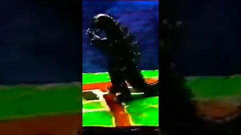 Godzilla destroys a power plant.