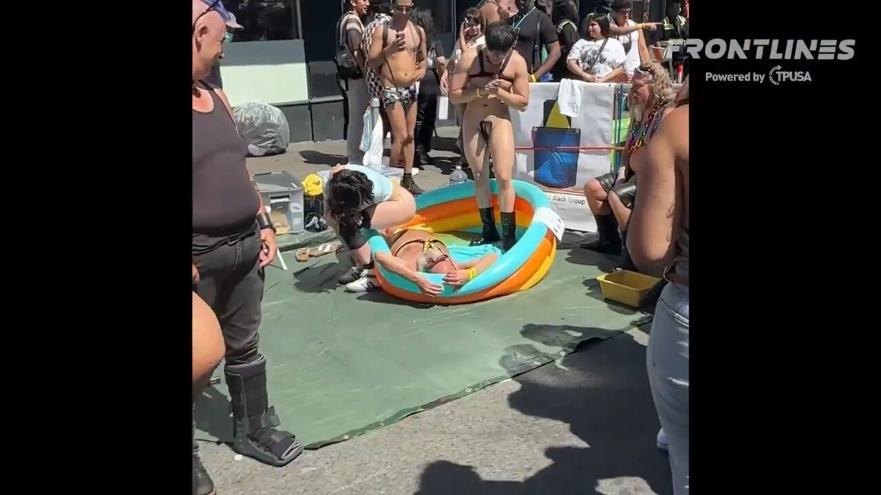 Man Lies In An Inflatable Pool Of Urine In Fetish Zone Where Attendees Are Encouraged To Pee On Him