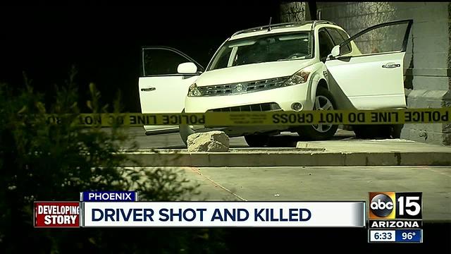 Three detained after body found in SUV in west Phoenix