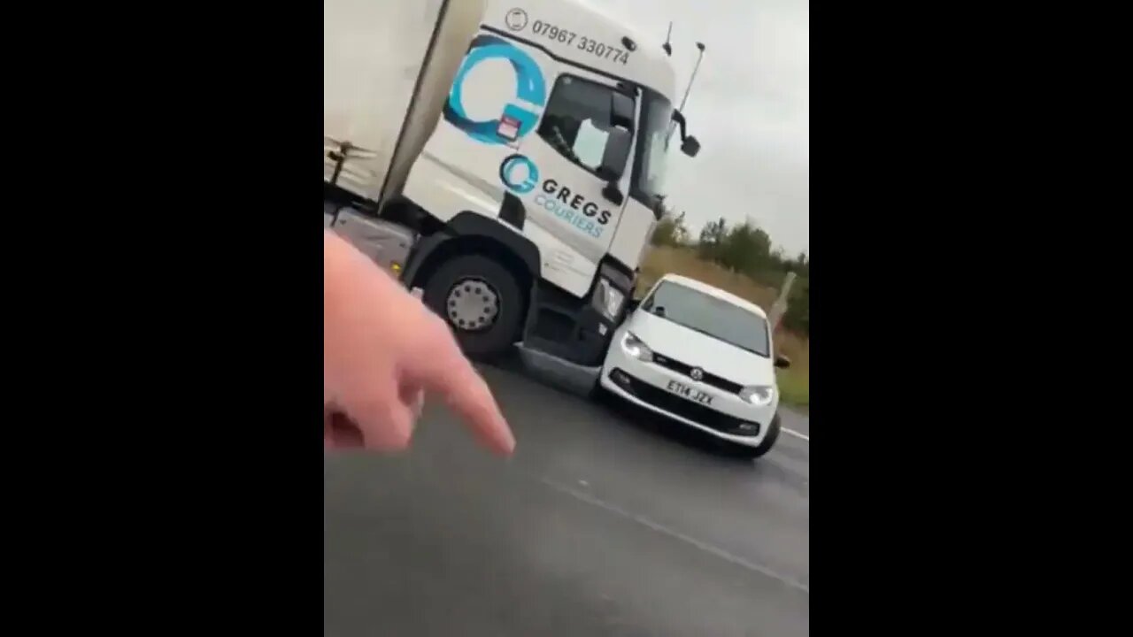 Lorry Unknowingly Pushes Car Down Motorway