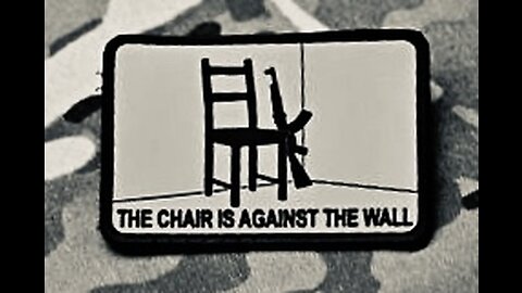 THE CHAIR IS AGAINST THE WALL