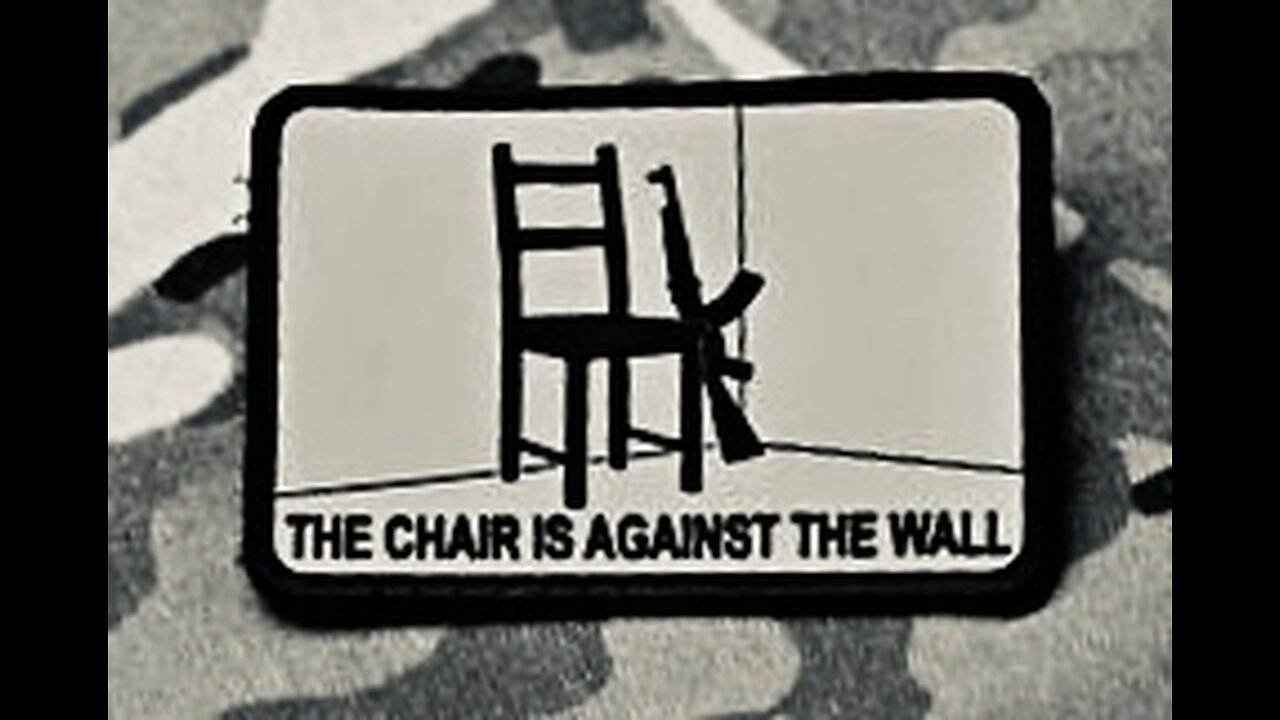 THE CHAIR IS AGAINST THE WALL