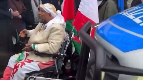 Pro-Hamas Dope Falls In Front Of A Police Van In Germany To Fake Martyrdom