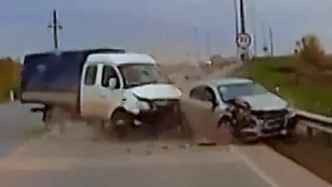 Truck fails to yield at intersection and smashes into a vehicle.