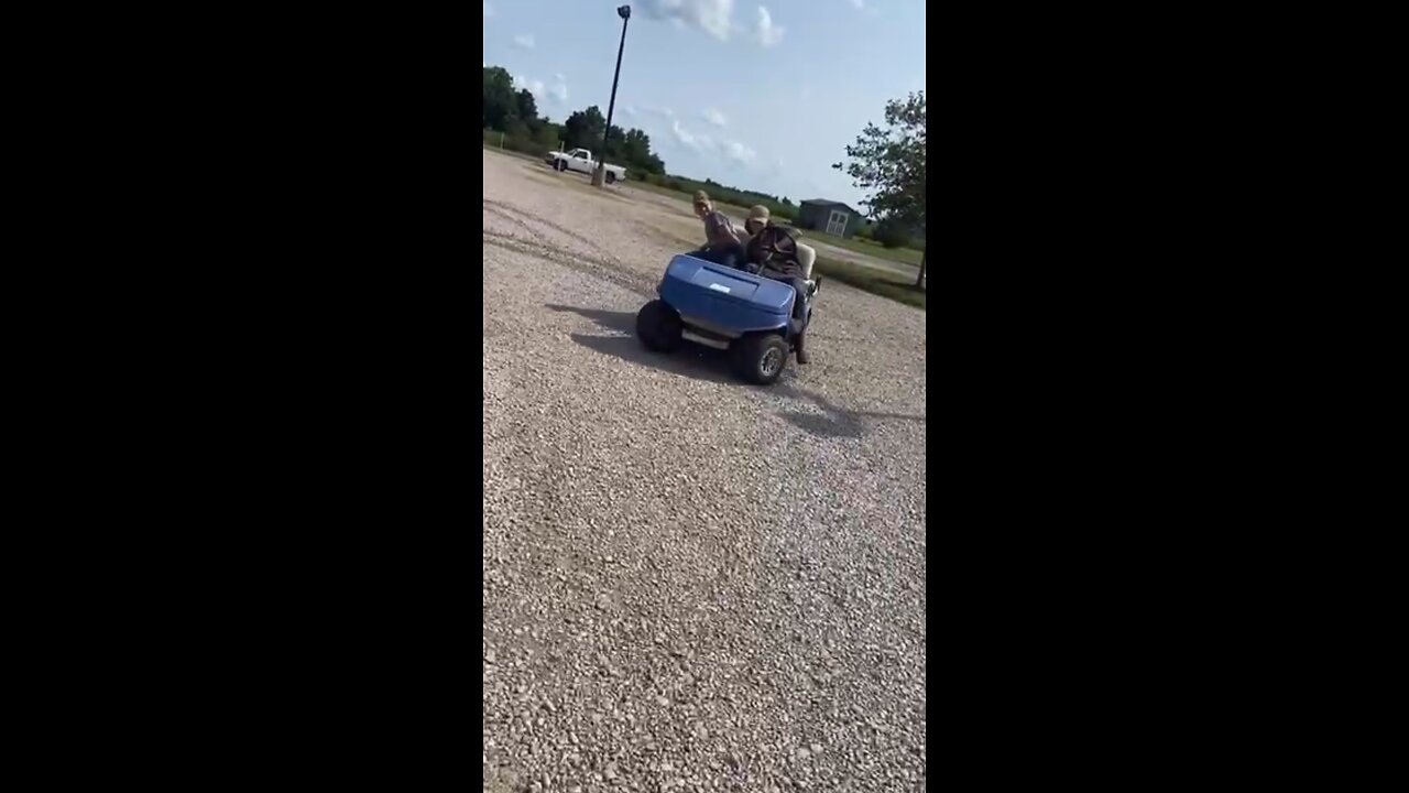 Golf cart drifting.