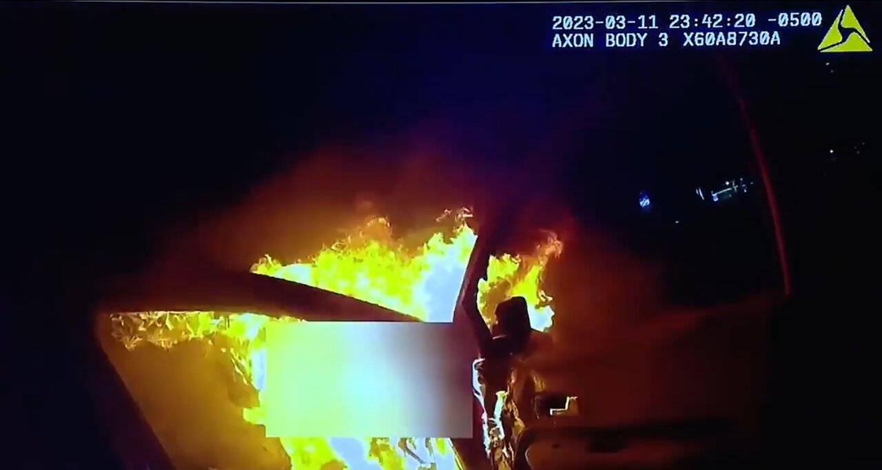 Michigan Cop Pulls Driver From Burning Car