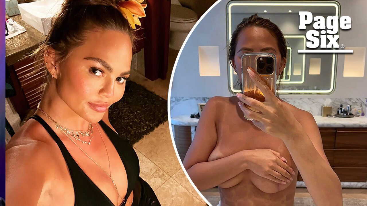 Chrissy Teigen poses totally nude in steamy mirror selfie