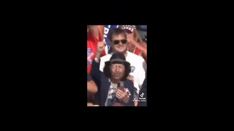 Suspicious man in TRUMP RALLY celebrates when TRUMP is SHOT