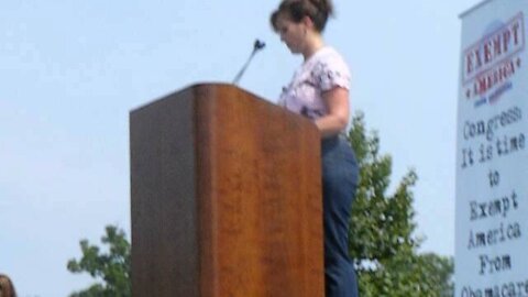A mother speaks of the effects of Obamacare at the Exempt america rally