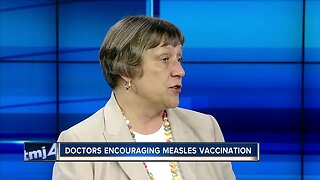 Doctors encouraging measles vaccination