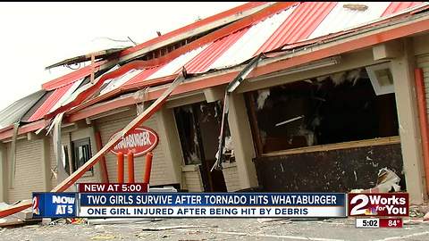 Friends cling to each other while tornado rips apart midtown Whataburger