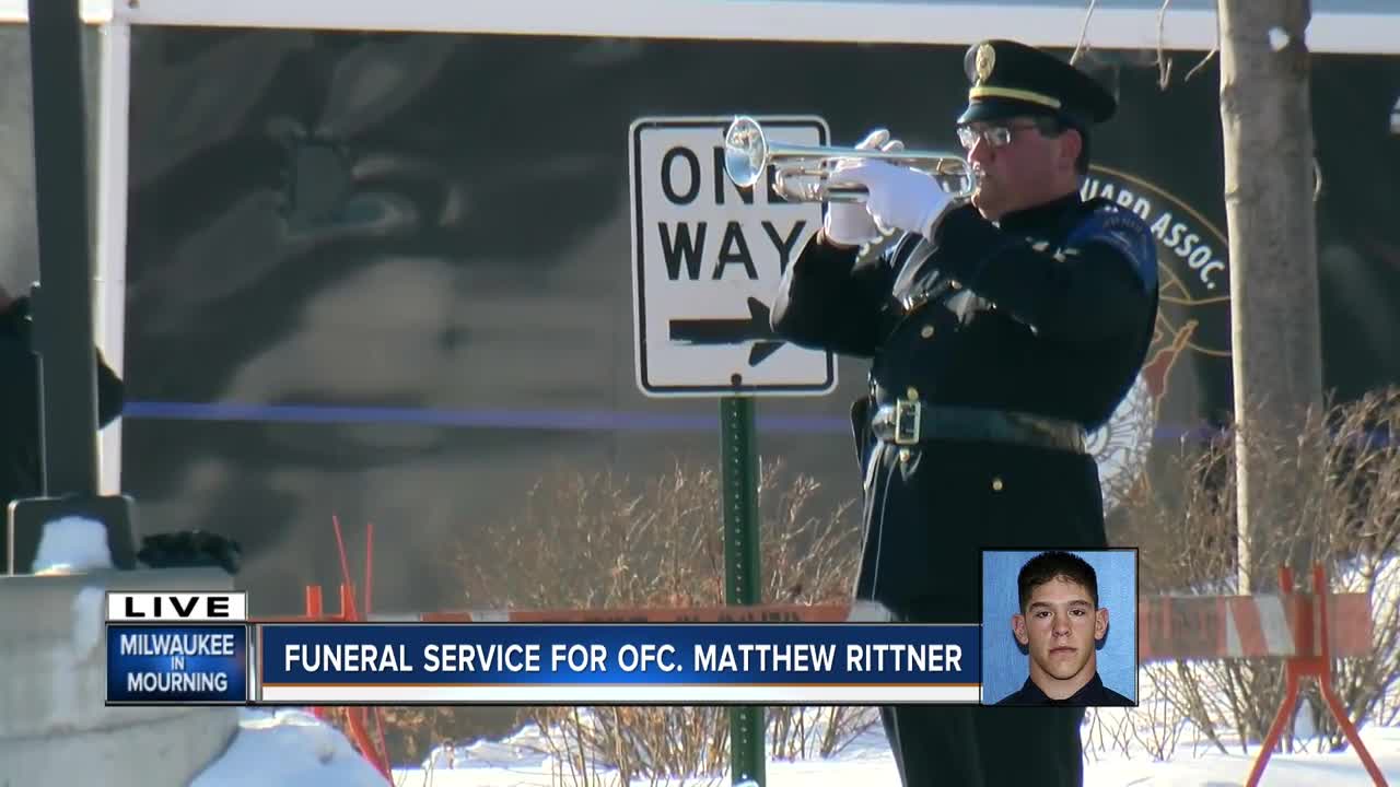 The gun salute and Taps at Matthew Rittner's funeral