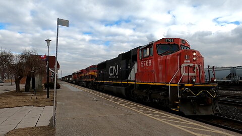 CN 5768 KCS 6796 & BNSF 5758 Engines Manifest Train West In Ontario