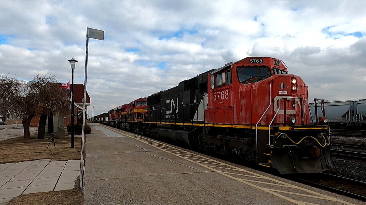 CN 5768 KCS 6796 & BNSF 5758 Engines Manifest Train West In Ontario