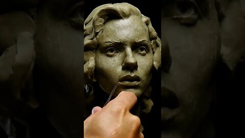 Female Portrait Sculpting In Clay.