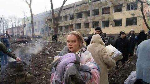 A women who was said to be killed during Russian airstrikes is seen alive & well