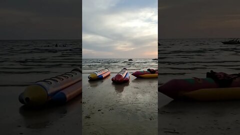 Sunset and Playtime at Chao Lao Beach, Thailand