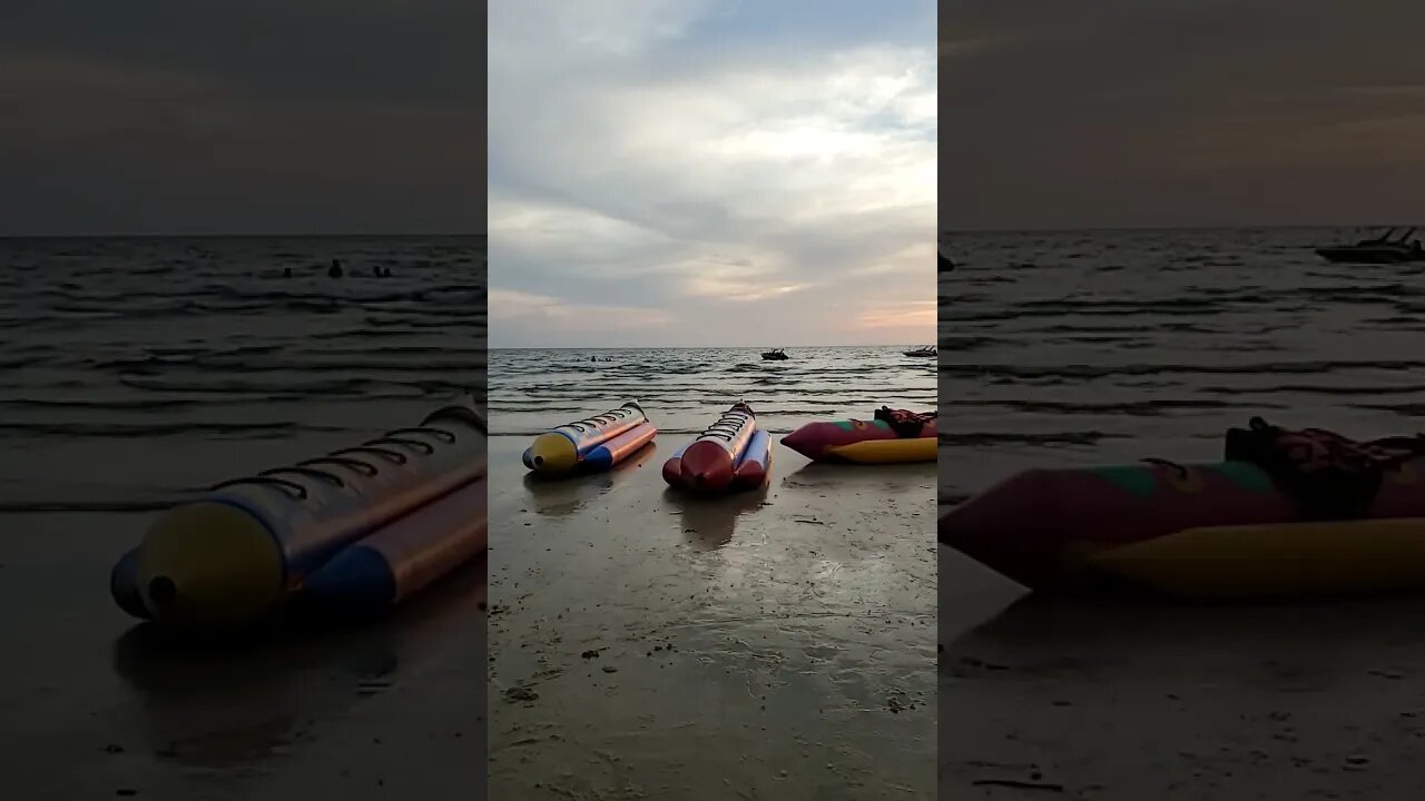 Sunset and Playtime at Chao Lao Beach, Thailand