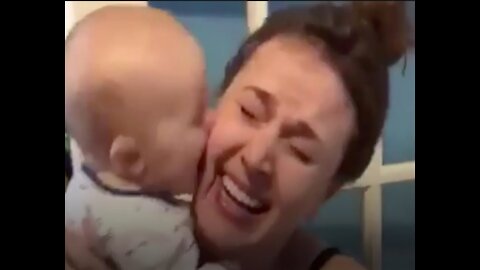9-month-old baby covers mom in kisses in viral video