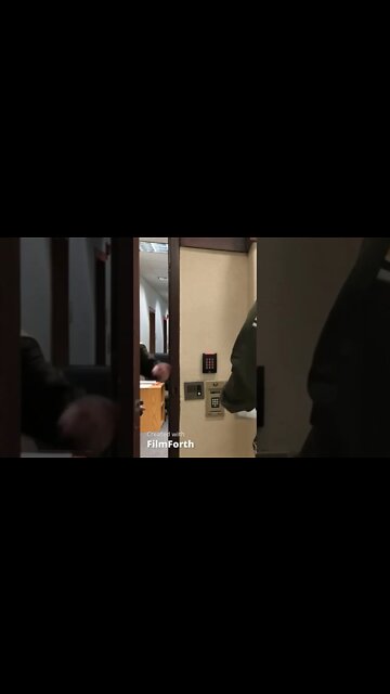 Cop Hides behind door