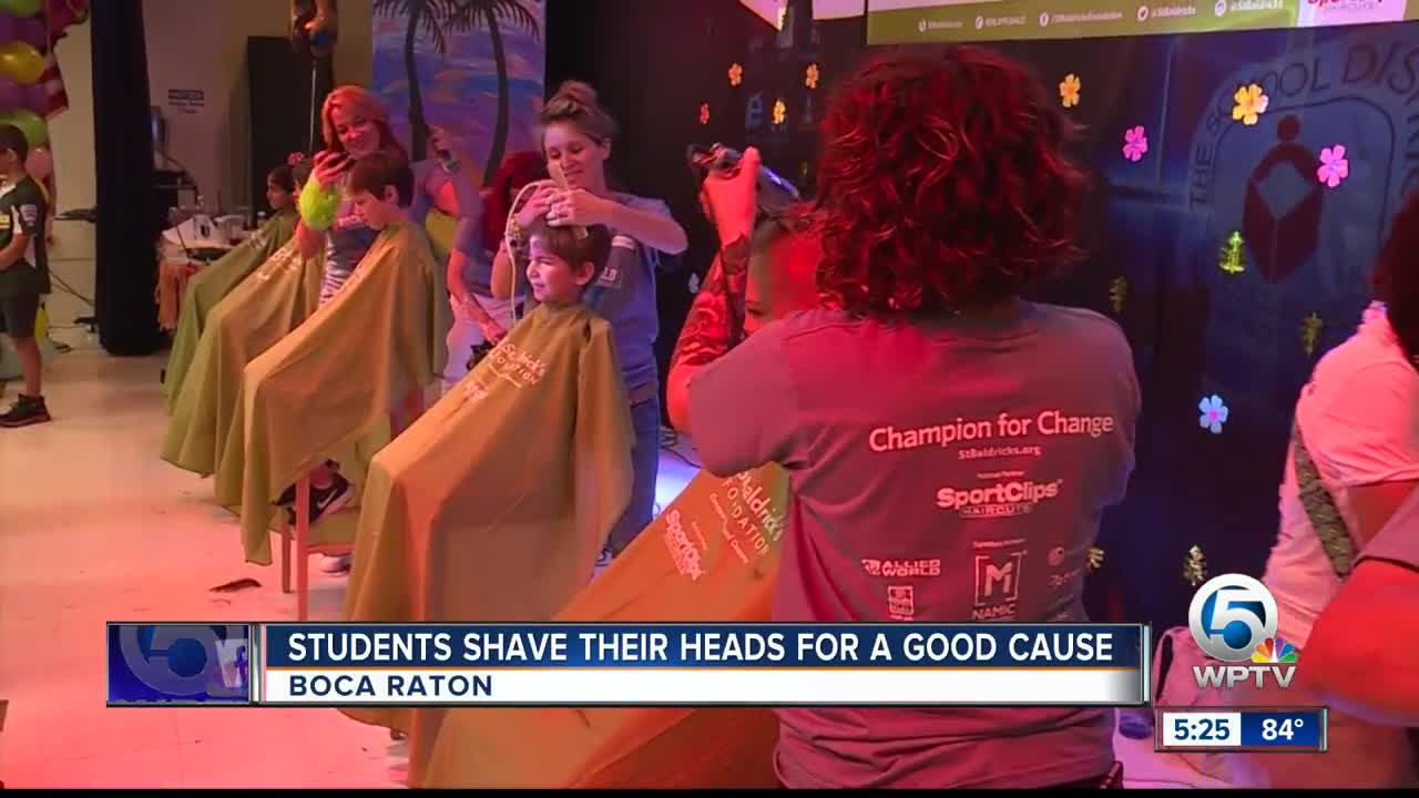 Students shave their heads for a good cause