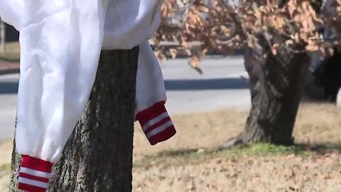 Group ties coats to trees, benches for those in need