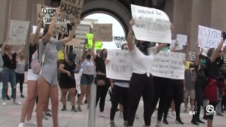 Protesters march from Rosemary Square to the Palm Beach County Courthouse