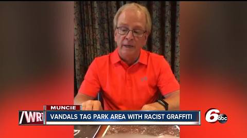 Police are looking for vandals who scrawled racist graffiti in a Muncie park