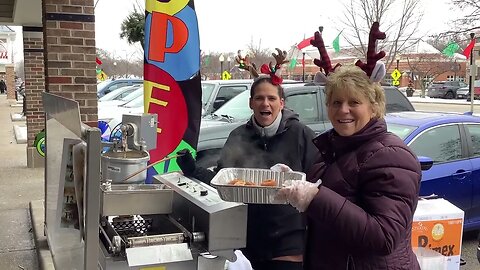 Kim and Lisa making donuts at Gift of Wings