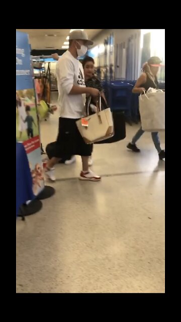 Thieves cut wires and walk out with purses and a hamper full of merchandise