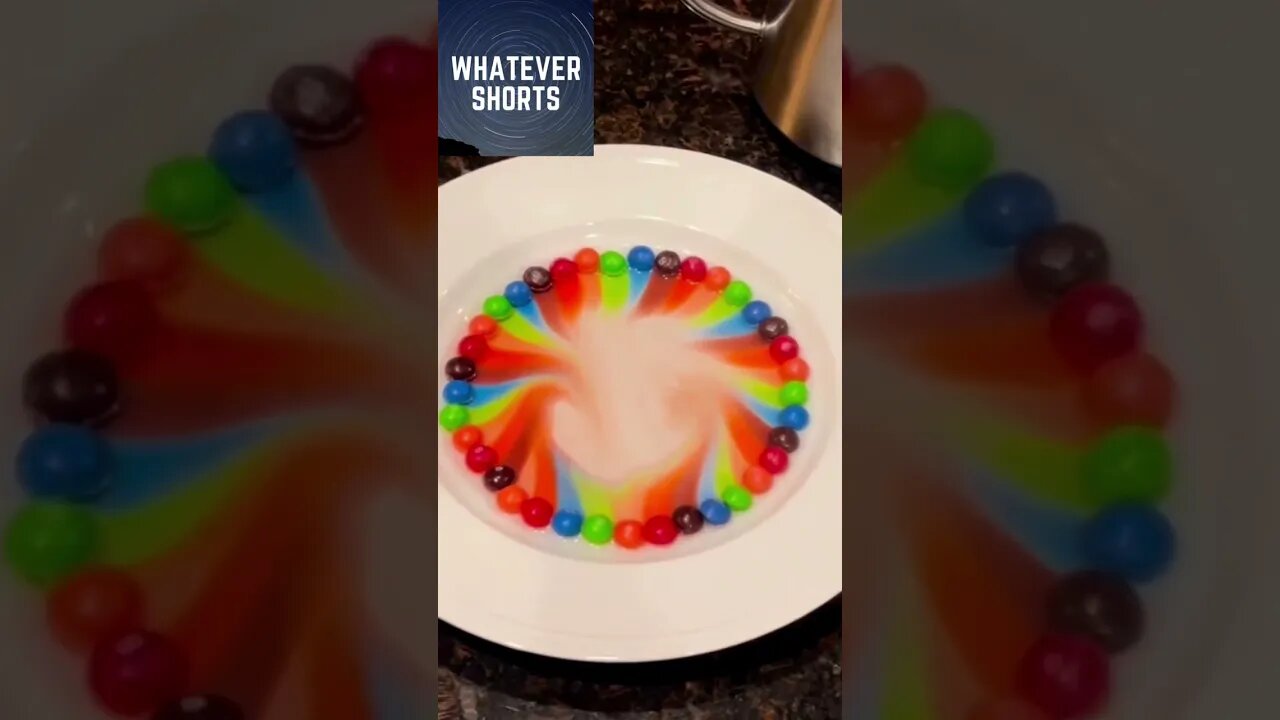 Candies being dissolved by hot water and they bleed colour's #shorts #colour #candy #rainbow