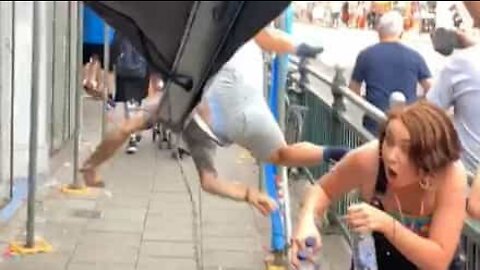 Falling dancer saved by shop awning