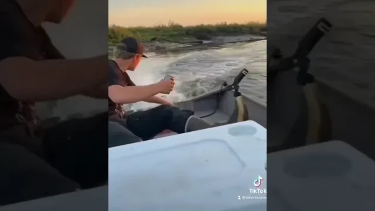 Dude drops his boat's motor in the water